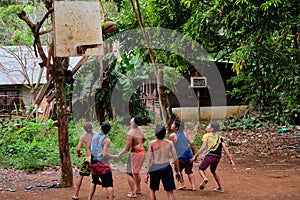 Boracay, Philippines - Jan 26, 2020: Local residents play basketball on an unequipped Playground.