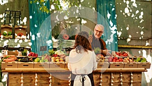 Local stand holders preparing farmers market counter