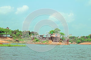 Local stilt houses built on Kaptai Lake, Rangamati, Bangladesh