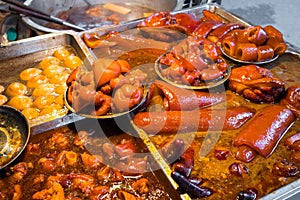 local street food with pork legs and meat ball