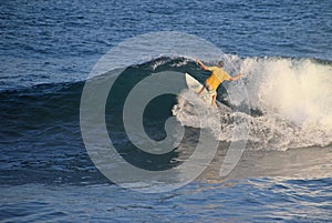 Local surfer in the wave, El Zonte beach, El Salvador