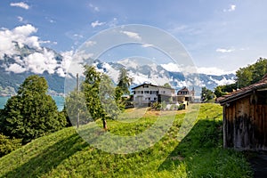 The local Swiss houses with Alps landscape , Switzerland