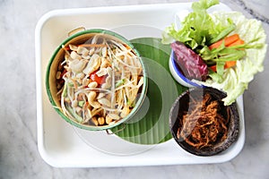 Local Thai food somtum with pork amd sticky rice photo