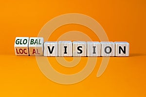 From local to global vision. Turned cubes and changed words `local vision` to `global vision`. Beautiful orange background, co