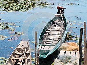 Local traditional fishing long tail boat of fisherman in lake river in nature, Phatthalung, Thailand
