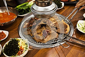 Local traditional korean gourmet food black pig of Jeju Island for grilled roasted barbecue pork and seasoning side dish for