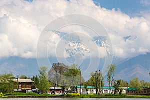 Local village mountain background along the border of Dal lake