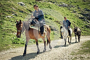 Local villagers use horses for easy mountain biking and road trips