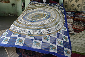 Local weaver displays dhurrie rugs