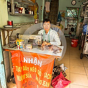 Local woman seamstress worker