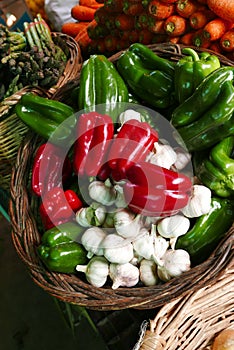 Locally-grown garlics, green and red peppers in a vegetable stall in Valparaisoâ€™s old grocery market, Chile