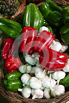 Locally-grown garlics, green and red peppers in a vegetable stall in Valparaisoâ€™s old grocery market, Chile