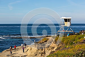 Locals and tourists enjoying a beautiful day during the winter time in San Diego beach, in southern California, USA