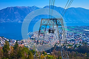 Locarno behind the tower of Cardada Cimetta cable car, Switzerland