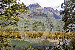 Mirror Lake with Earl Mountains in the background  in Fiordland National Park, New Zealand.