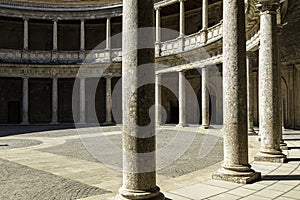 On top of the hill `Assabica` in Granada is a majestic palace that once belonged to Charles V. In Granada this palace is called `P