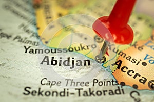 Location Abidjan in Ivory Coast or Cote D'ivoire, map with push pin close-up, travel and journey concept with marker
