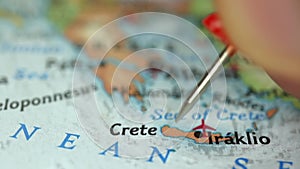 Location Crete and Iraklio, push pin on map close-up, marker of destination for travel, tourism and trip concept, Europe