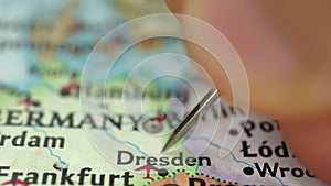 Location Dresden in Germany, push pin on map close-up, marker of destination for travel, tourism and trip concept