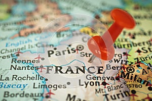 Location France, push pin on map close-up, marker of destination for travel, tourism and trip concept, Europe