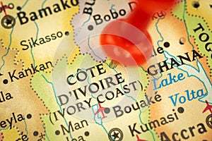 Location Ivory Coast or Cote D'ivoire, map with push pin close-up, travel and journey concept with marker, Africa