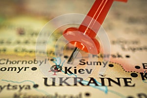 Location Kiev in Ukraine, push pin on map close-up, marker of destination for travel, tourism and trip concept, Europe