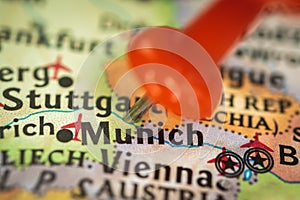 Location Munich in Germany, push pin on map close-up, marker of destination for travel, tourism and trip concept, Europe