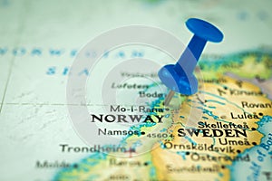 Location Norway, push pin on map close-up, marker of destination for travel, tourism and trip concept, Europe