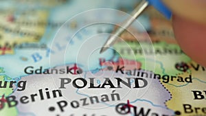 Location Poland, push pin on map close-up, marker of destination for travel, tourism and trip concept, Europe