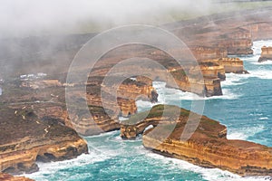 Loch Ard Gorge aerial view from helicopter with clouds and fog