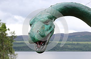 Loch Ness Monster statue with Loch Ness in the background photo