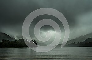 Loch Shiel With Dark Clouds And Rainy Weather Near Glenfinnan In Scotland