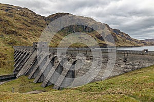 Lochan reservoir and dam in Scottish Trossachs near Ben Lawers