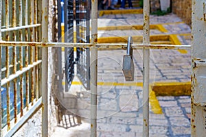 Lock and bars in an alley, old city of Jaffa