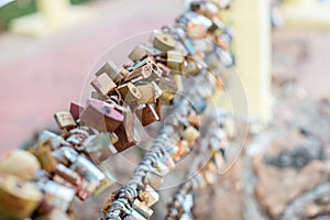 Lock for couple make a promise to love forever, master keys hanging on the rails of bridge, the sign of love and romantic affectio