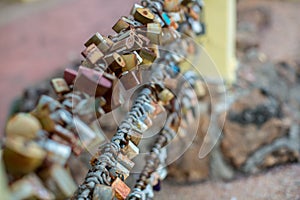 Lock for couple make a promise to love forever, master keys hanging on the rails of bridge, the sign of love and romantic affectio