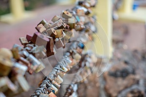 Lock for couple make a promise to love forever, master keys hanging on the rails of bridge, the sign of love and romantic affectio