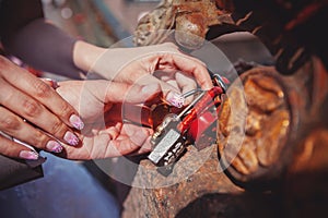 The lock in hands of newlyweds