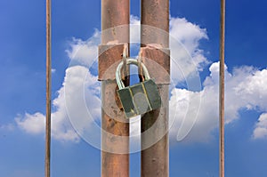 Lock key on rusty fence