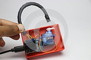 Lock made using 3d printed technology controlled by microcontroller and servo with OLED display photo