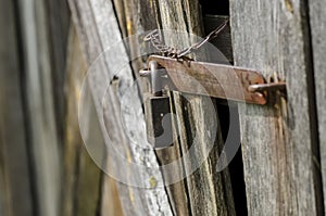 Lock on an old wooden barn door