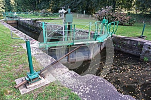 A lock on the Oust River in Josselin, France is part of the important Nantes-Brest Canal system.