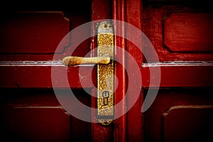 A lock in the red door of Peking University.