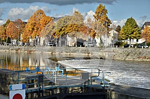 Lock on the river Mayenne at Laval in France photo