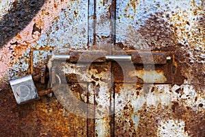 Lock on rusty iron door