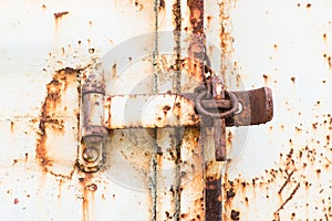 Lock on rusty iron door