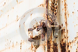 Lock on rusty iron door