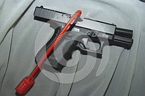 Lock securing gun