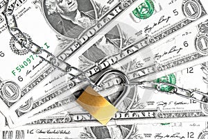 Lock security and chain on dollars banknotes background