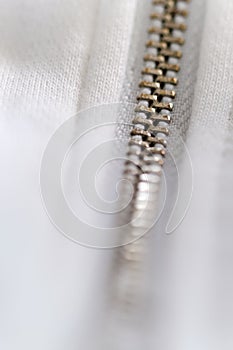 Lock white metal zipper closeup detail view